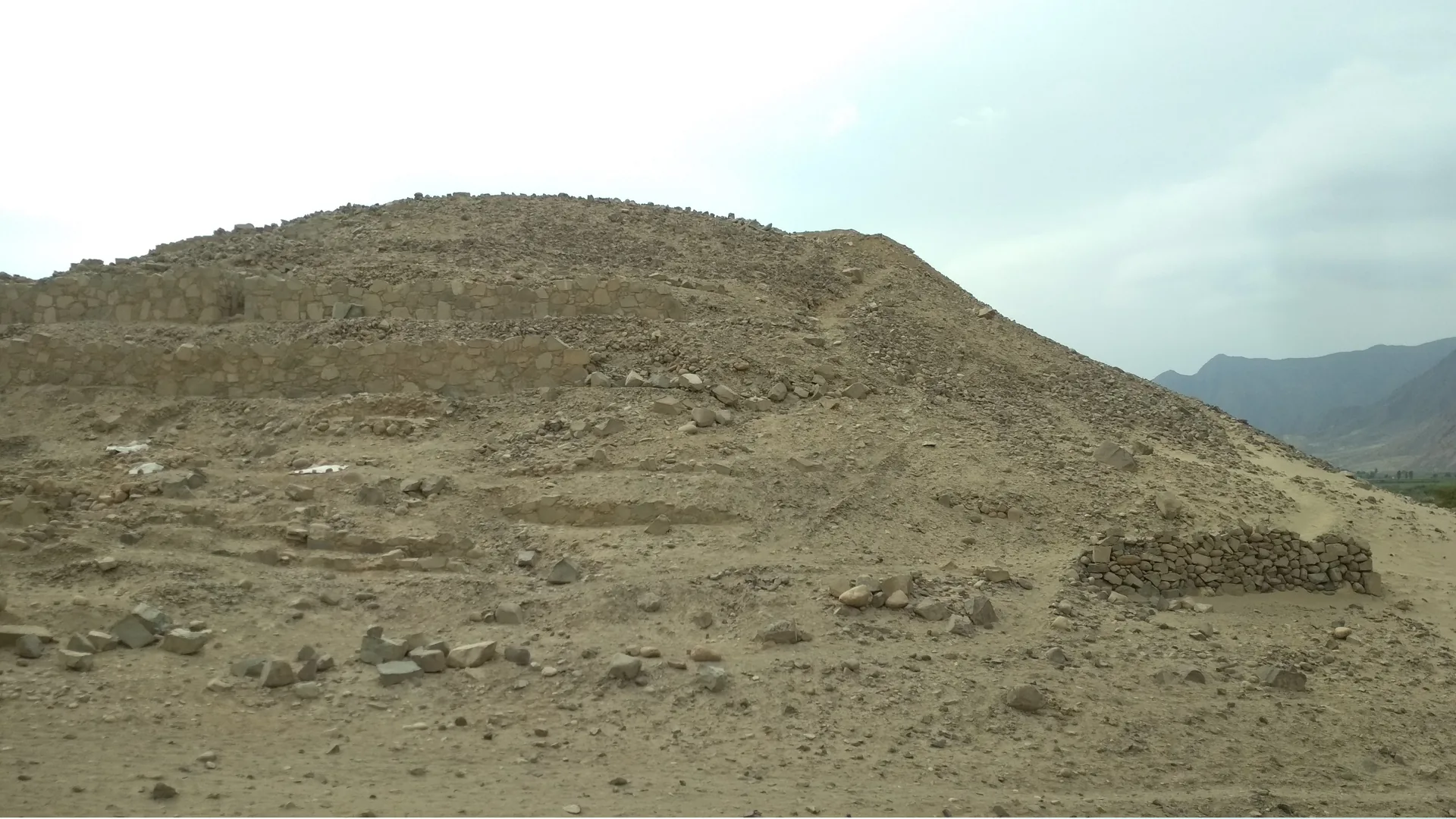 The ancient earthen pyramids of Caral in a desert valley in Peru